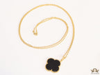 Black enamel clover pendant in gold plated chain