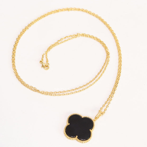 Black enamel clover pendant in gold plated chain