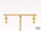 Gold plated hoop earrings with double T motifs