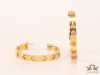 Gold plated hoop earrings with double T motifs 38 mm