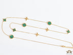 Golden chain necklace with malachite green clovers