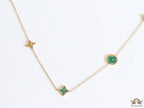 Golden chain necklace with malachite green clovers