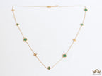 Golden chain necklace with malachite green clovers