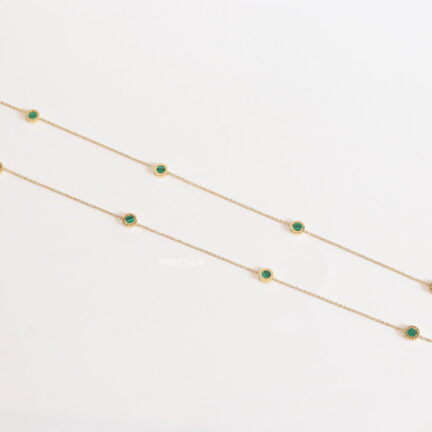 Golden chain necklace with malachite green roman numeral discs
