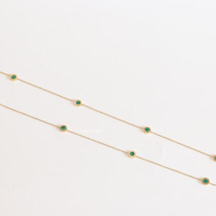 Golden chain necklace with malachite green roman numeral discs