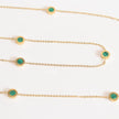 Golden chain necklace with malachite green roman numeral discs