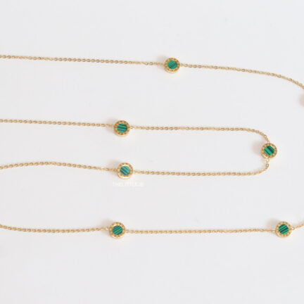 Golden chain necklace with malachite green roman numeral discs