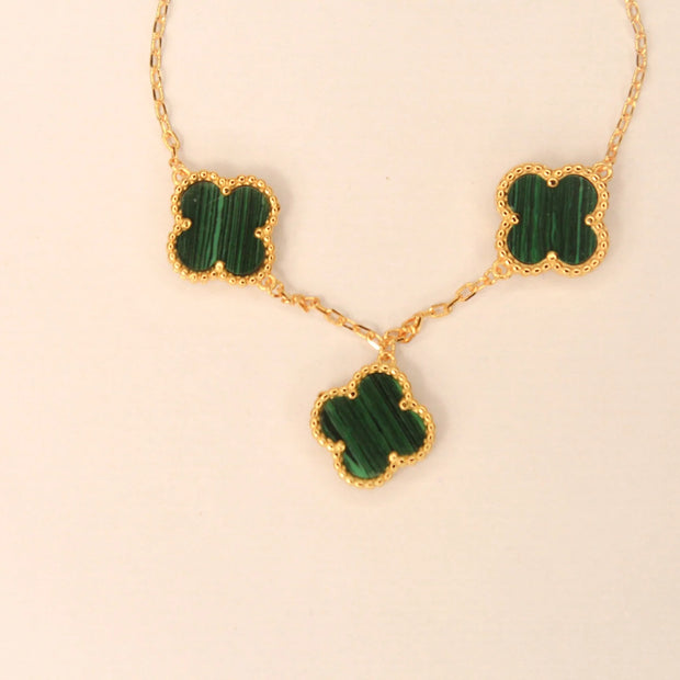 Gold Clover charms bracelet in green