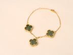 Gold Clover charms bracelet in green