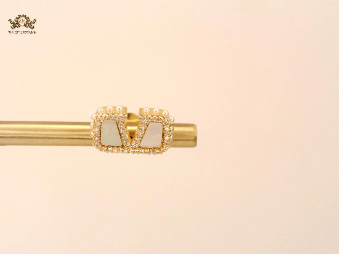 Alphabet V white mop earrings