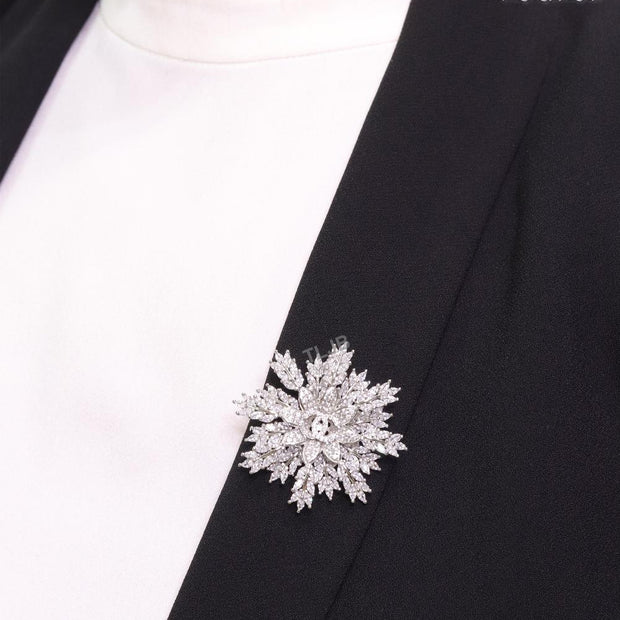 Flower and leaf brooch in platinum finish and cz
