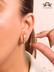Gold and cz serpentine studs
