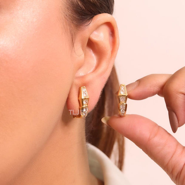 Gold and cz serpentine studs