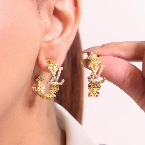 Alphabet L & V gold and cz statement hoops
