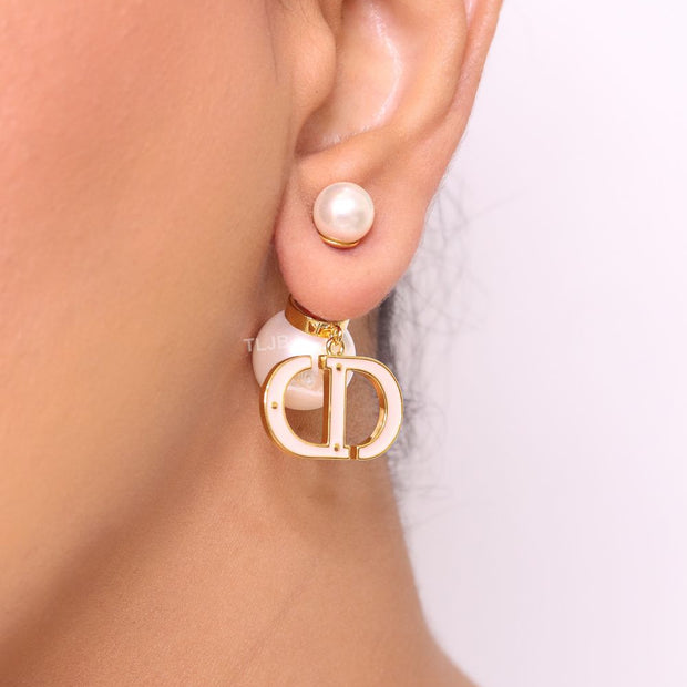 Pearl and white  enamel CD bombers