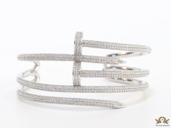 Platinum plated twin nail bracelet with cz
