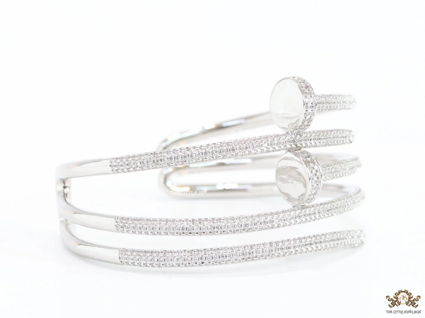 Platinum plated twin nail bracelet with cz