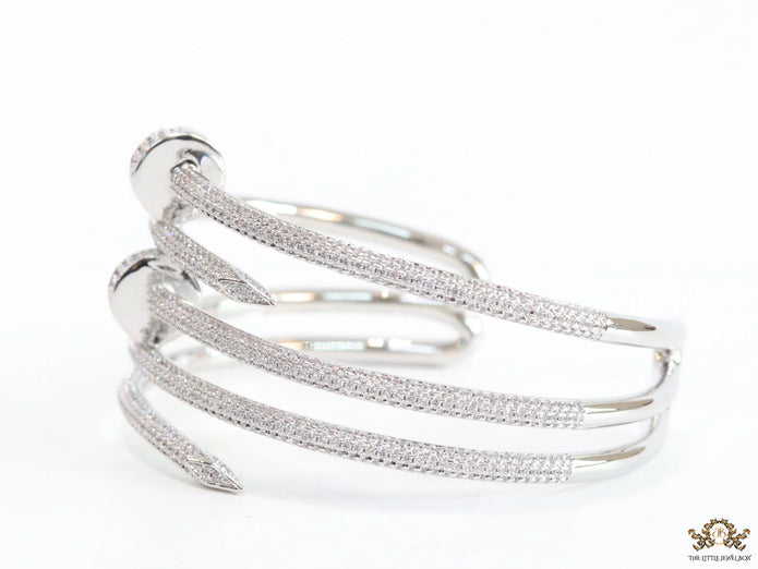 Platinum plated twin nail bracelet with cz