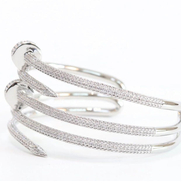 Platinum plated twin nail bracelet with cz