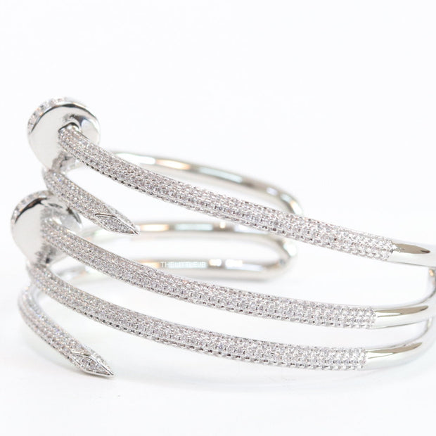 Platinum plated twin nail bracelet with cz