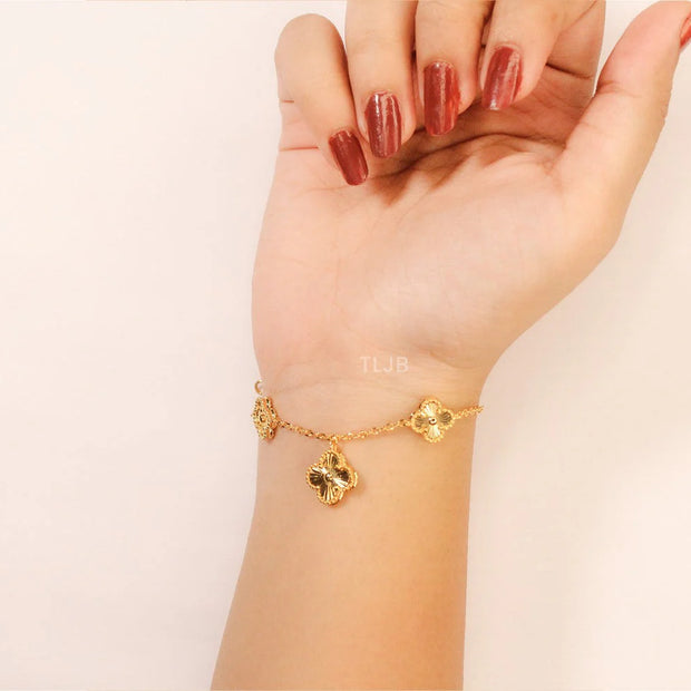 Golden Clover charms bracelet in gold