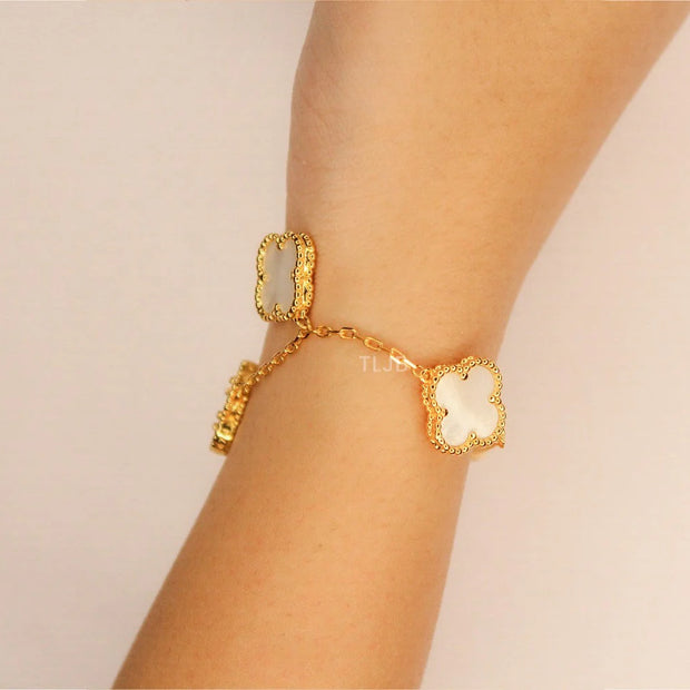 Gold Clover charms bracelet in white