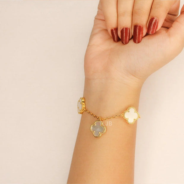 Gold Clover charms bracelet in white