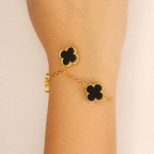 Gold Clover charms bracelet in Black