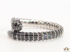 Serpentine open bracelet in black enamel and platinum finish