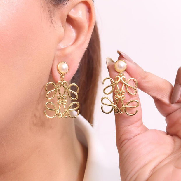 Alphabet L pearl and gold danglers