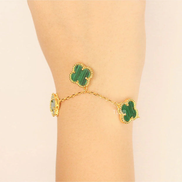 Gold Clover charms bracelet in green