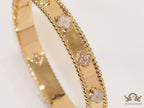 Gold plated bracelet with clover motifs in cz and MOP