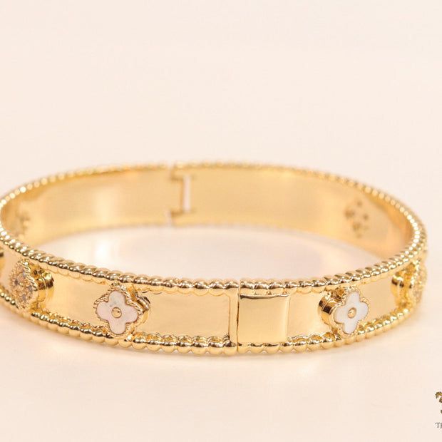 Gold plated bracelet with clover motifs in cz and MOP