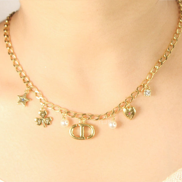 Alphabet CD charms Gold necklace matt finish