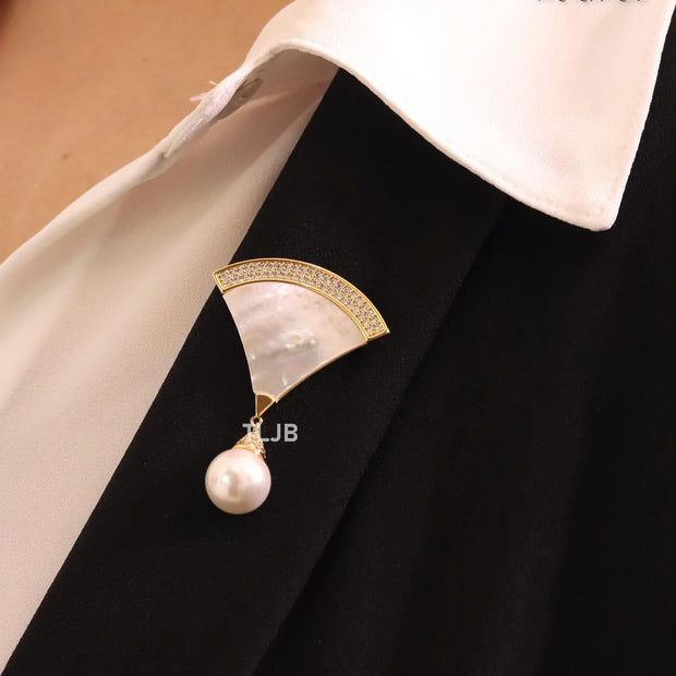 White enamel brooch with pearl