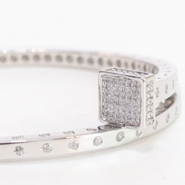 Platinum plated cz bracelet with cz head