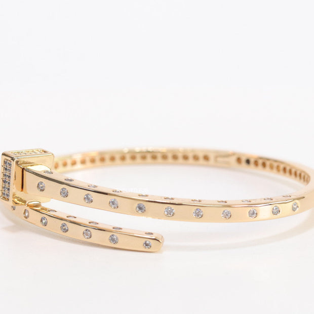 Golden cz bracelet with cz head