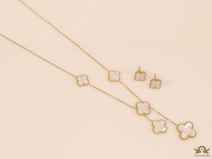 Gold plated necklace set with mother of pearl clovers