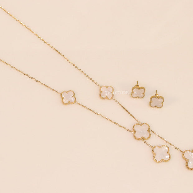 Gold plated necklace set with mother of pearl clovers
