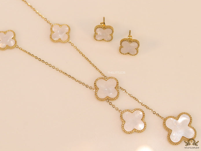 Gold plated necklace set with mother of pearl clovers