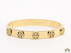Gold plated bracelet with twin T motifs