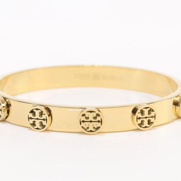 Gold plated bracelet with twin T motifs
