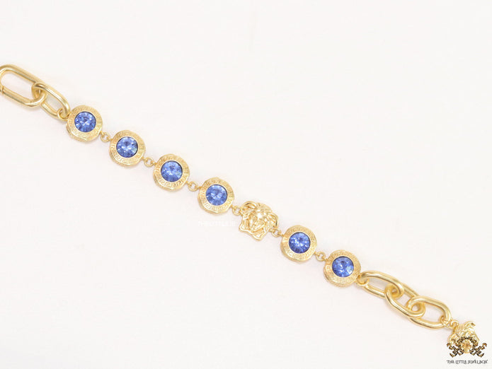 Designer golden Medusa chain bracelet with fancy cut cz