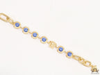 Designer golden Medusa chain bracelet with fancy cut cz