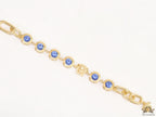 Designer golden Medusa chain bracelet with fancy cut cz
