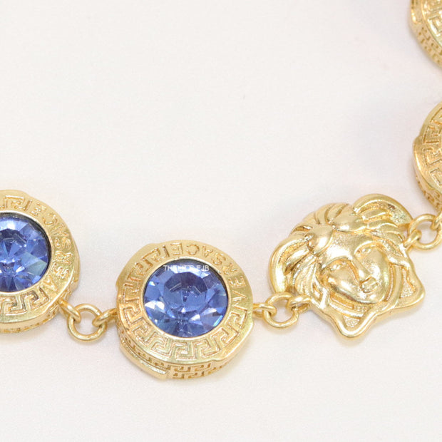 Designer golden Medusa chain bracelet with fancy cut cz