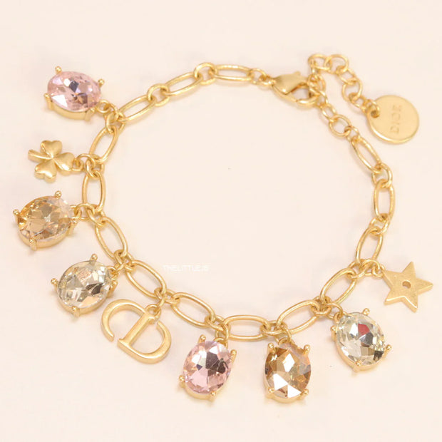 Golden chain bracelet with alphabet and cz charms
