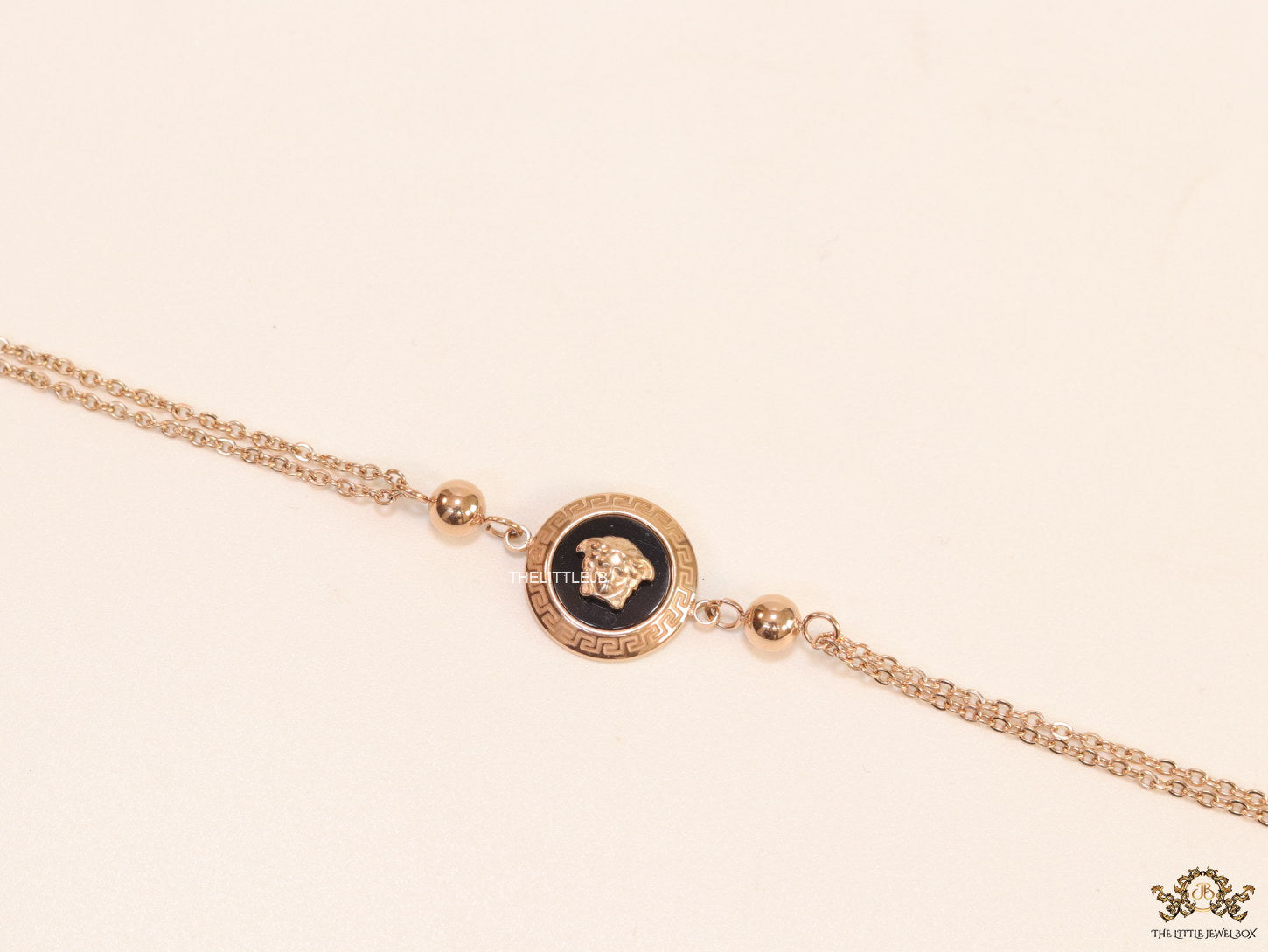 Double chain Medusa bracelet in rose gold
