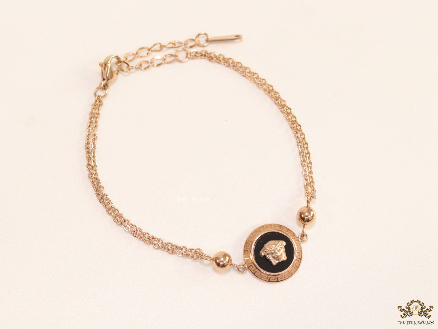 Double chain Medusa bracelet in rose gold