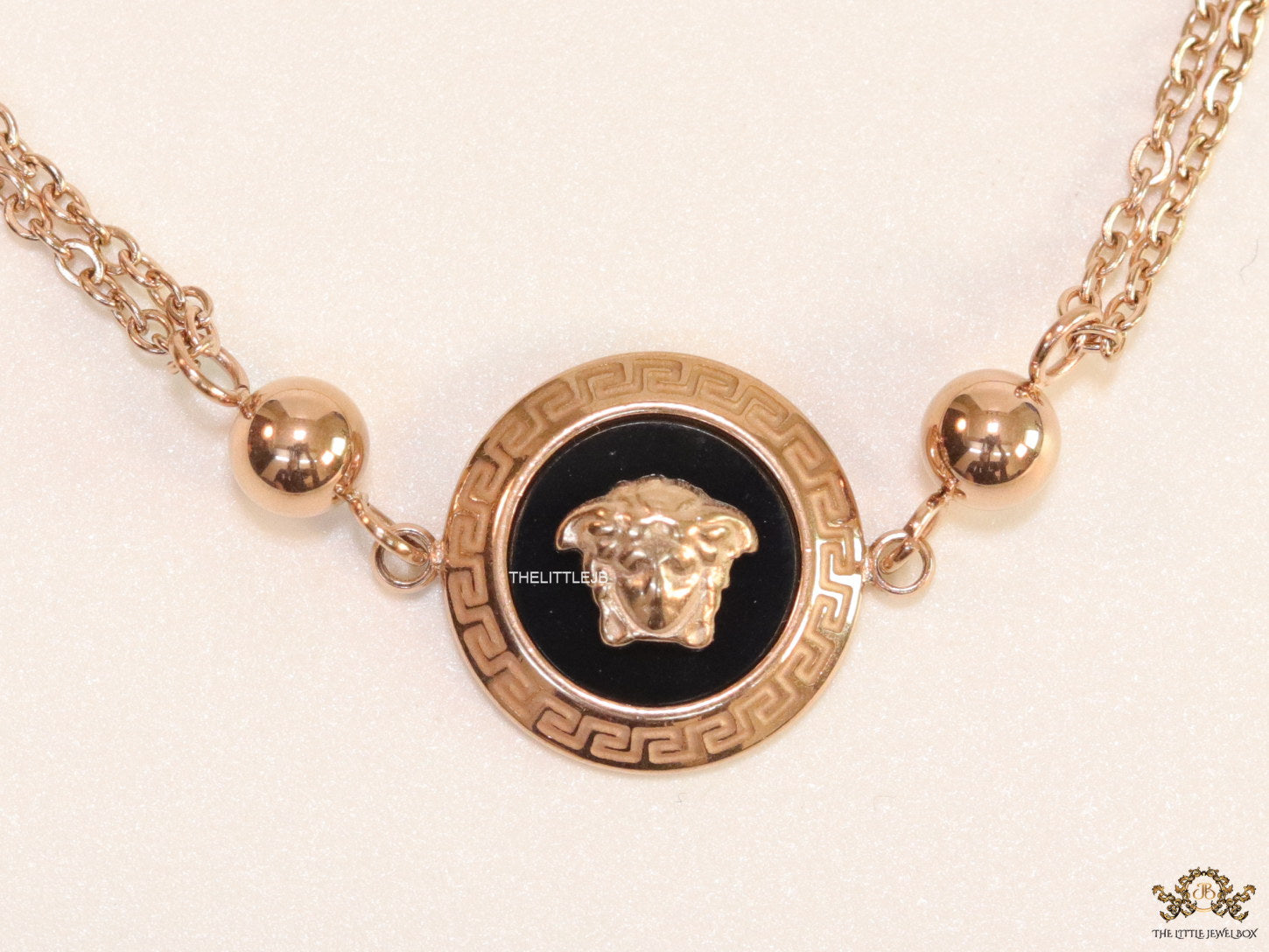 Double chain Medusa bracelet in rose gold